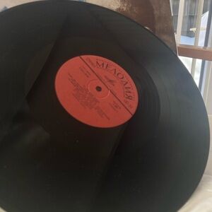 Vintage Vinyl Record with Red Label